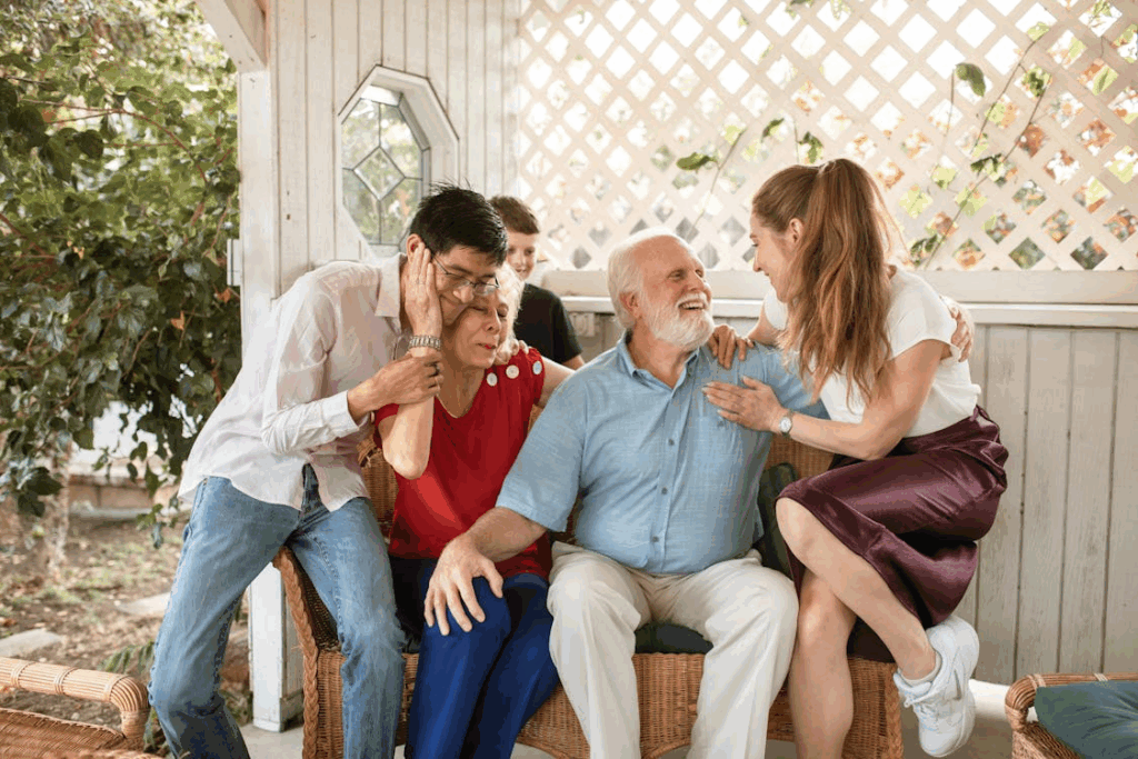 Grandparents surrounded by children and family, balancing love with financial security