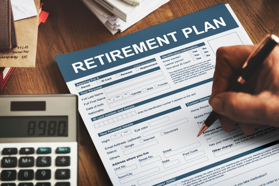 Person preparing retirement plan paperwork as part of annuity and income strategy